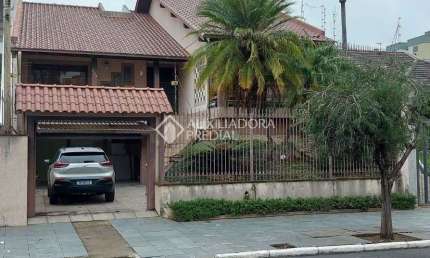 Casa com 3 quartos à venda na Rua Caxias, 229, Centro, Esteio, 259 m2 por R$ 1.060.000