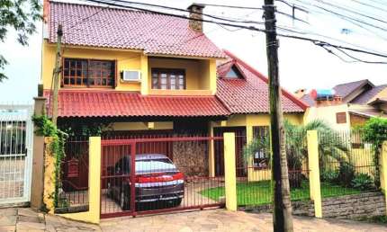 Casa com 3 quartos à venda na Rua Conde de Porto Alegre, 111, Nossa Senhora das Graças, Canoas, 184 m2 por R$ 1.060.000