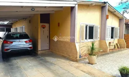 Casa com 3 quartos à venda na Rua Santa Rita de Cássia, 193, Parque Tamandaré, Esteio, 106 m2 por R$ 535.000