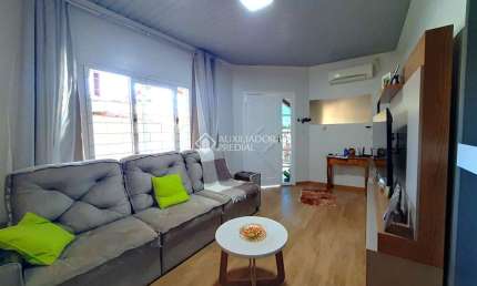Casa com 3 quartos à venda na Marta Pugin, 63, Harmonia, Canoas, 150 m2 por R$ 319.200
