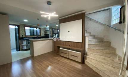 Casa em condomínio fechado com 2 quartos à venda na Rua Fernando Abbot, 50, Nossa Senhora das Graças, Canoas, 69 m2 por R$ 300.000