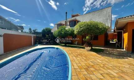 Casa com 5 quartos à venda na Rua Escócia, 29, Marechal Rondon, Canoas, 500 m2 por R$ 2.200.000