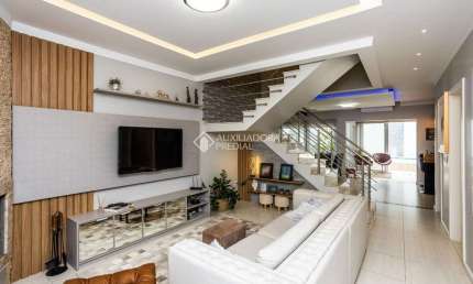 Casa em condomínio fechado com 4 quartos à venda na Rua Bélgica, 76, Marechal Rondon, Canoas, 221 m2 por R$ 1.999.000