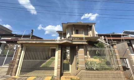 Casa com 3 quartos à venda na Avenida Doutor Severo da Silva, 1173, Estância Velha, Canoas, 159 m2 por R$ 990.000