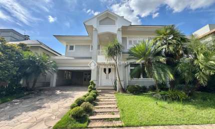 Casa em condomínio fechado com 3 quartos à venda na Rua Monte Castelo, 2007, Marechal Rondon, Canoas, 430 m2 por R$ 2.890.000