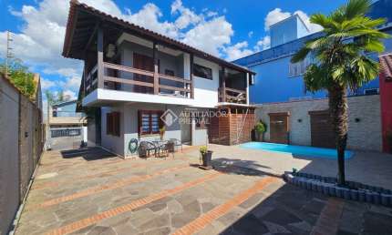 Casa com 4 quartos à venda na Rua Armando Dias Azevedo, 65, São José, Canoas, 219 m2 por R$ 1.030.000