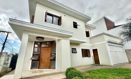 Casa com 4 quartos à venda na Rua País de Gales, 740, Estância Velha, Canoas, 274 m2 por R$ 1.390.000