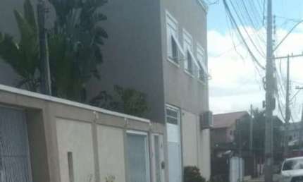 Casa com 3 quartos à venda na Rua Nordeste, 111, Estância Velha, Canoas, 100 m2 por R$ 900.000