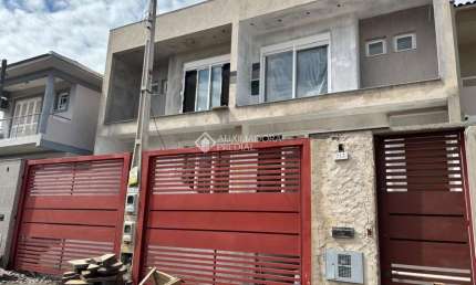 Casa com 3 quartos à venda na Rua Dinamarca, 223, Estância Velha, Canoas, 200 m2 por R$ 1.450.000