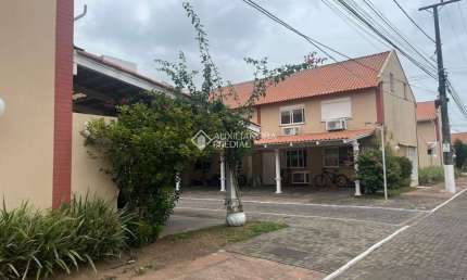 Casa em condomínio fechado com 2 quartos à venda na Rua Treze de Maio, 630, Rio Branco, Canoas, 103 m2 por R$ 280.000