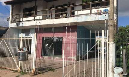 Casa com 3 quartos à venda na Rua Fernando Ferrari, 2688, Niterói, Canoas, 440 m2 por R$ 690.000