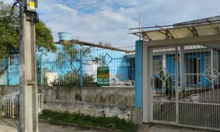 Casa com 3 quartos à venda na D CINCO, 19, Guajuviras, Canoas, 72 m2 por R$ 372.000