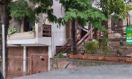 Casa com 3 quartos à venda na Rua General Salustiano, 643, Marechal Rondon, Canoas, 255 m2 por R$ 1.500.000