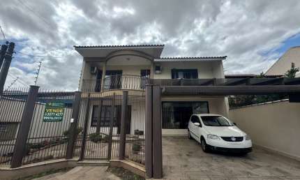 Casa com 4 quartos à venda na Rua da Felicidade, 124, Estância Velha, Canoas, 204 m2 por R$ 1.100.000