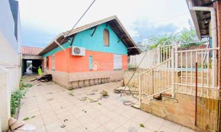 Casa em condomínio fechado com 4 quartos à venda na Rua Saldanha da Gama, 426, Harmonia, Canoas, 230 m2 por R$ 289.000