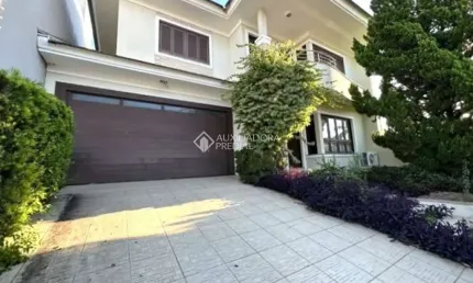 Casa com 3 quartos à venda na Rua País de Gales, 627, Marechal Rondon, Canoas, 196 m2 por R$ 1.350.000