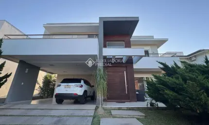 Casa em condomínio fechado com 3 quartos à venda na Avenida Açucena, 50, Estância Velha, Canoas, 340 m2 por R$ 2.950.000