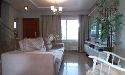 Casa com 3 quartos à venda na Rua Ulysses Gomes Ferreira, 89, Estância Velha, Canoas, 150 m2 por R$ 950.000