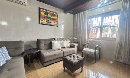 Casa com 4 quartos à venda na Rua Tramandai, 475, Estância Velha, Canoas, 236 m2 por R$ 700.000