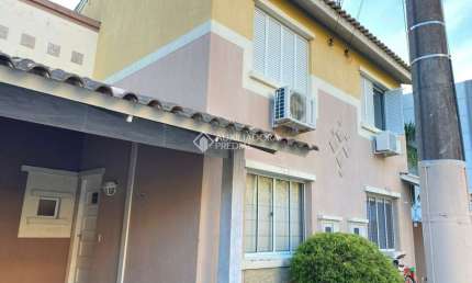 Casa em condomínio fechado com 4 quartos à venda na Rua Brasil, 333, Centro, Canoas, 90 m2 por R$ 475.000