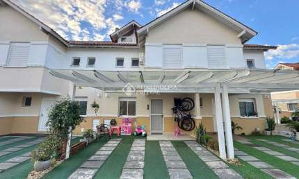 Casa em condomínio fechado com 3 quartos à venda na Avenida Açucena, 650, Estância Velha, Canoas, 132 m2 por R$ 910.000