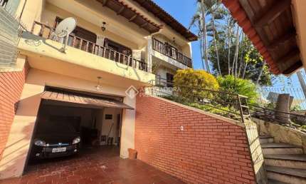 Casa com 5 quartos à venda na Rua Peru, 679, São José, Canoas, 283 m2 por R$ 899.000