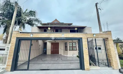 Casa com 4 quartos à venda na Rua João Paulo II, 73, Harmonia, Canoas, 196 m2 por R$ 999.000