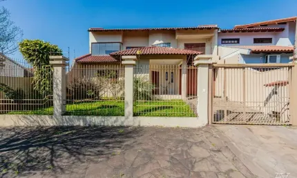 Casa com 4 quartos à venda na Avenida Doutor Severo da Silva, 263, Loteamento Bela Vista, Canoas, 226 m2 por R$ 852.000