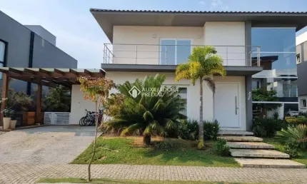 Casa em condomínio fechado com 3 quartos à venda na Rodovia Doutor Antônio Luiz Moura Gonzaga, 3825, Rio Tavares, Florianópolis, 310 m2 por R$ 6.360.000