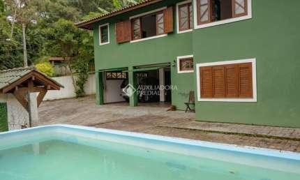 Casa com 4 quartos à venda na Servidão Recanto da Pedra, 3, Rio Tavares, Florianópolis, 396 m2 por R$ 1.900.000