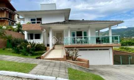Casa em condomínio fechado com 4 quartos à venda na Rodovia Haroldo Soares Glavan, 929, Cacupé, Florianópolis, 513 m2 por R$ 2.597.000