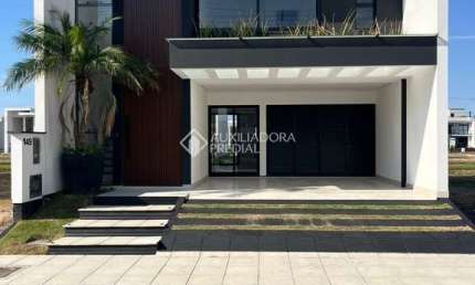 Casa em condomínio fechado com 3 quartos à venda na Avenida Deltaville, 360, Beira Rio, Biguaçu, 195 m2 por R$ 1.145.000