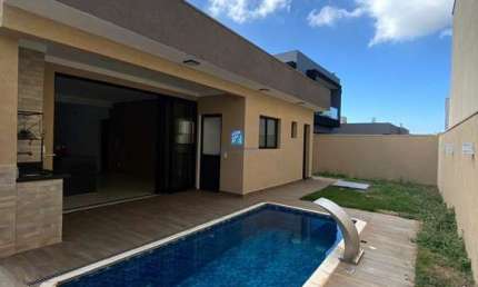 Casa à venda em Condomínio Quinta dos Ventos com 3 suítes