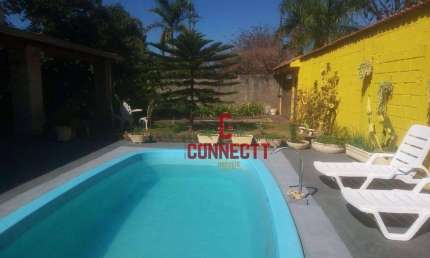 CASA DE 1000m² DE TERRENO  COM PISCINA NO CONDOMÍNIO PORTAL DOS IPÊS.