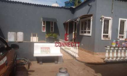 CASA DE 2 QUARTOS SENDO 1 SUITE  2 VAGAS DE GARAGEM.