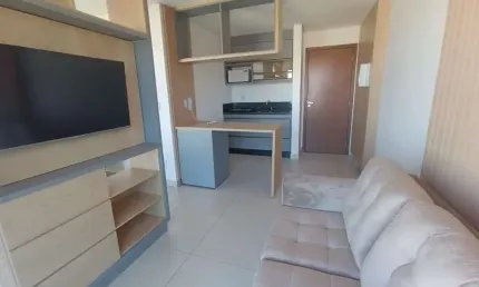 Apartamento mobiliado de 1 quartos 1 vaga no centro.