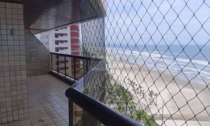 Apartamento 4 dormitórios sendo 4 suites,3 vagas, frente mar em  Praia Grande