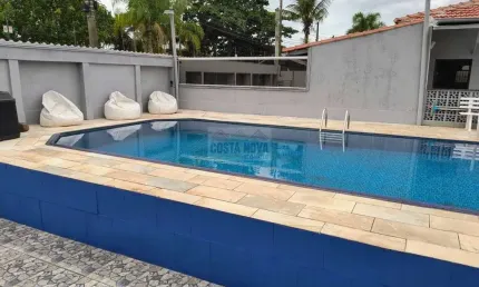 Casa à venda com Piscina - 550m² -  50 metros da Praia - Solemar - Praia Grande - SP.