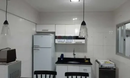 Apartamento com 64m², de 1 quarto e sala, a uma quadra da praia