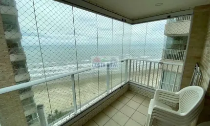 Apartamento pé na areia no mirim, frente mar, 2 dormitórios sendo 1 suíte, 2 banheiros, 1 vaga