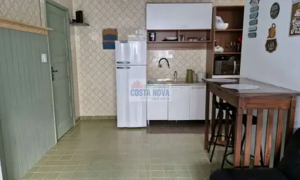 Kitnet à venda com 40m², 1 quarto, 1 banheiro e 1 vaga no bairro Tupi em Praia Grande frente ao mar