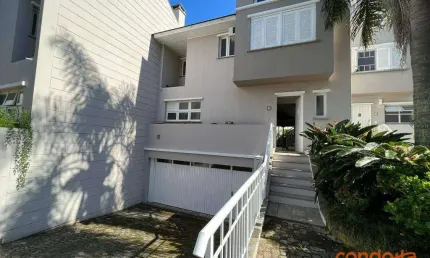 Casa com 3 dormitórios para alugar, 205 m² por R$ 10.535,01/mês - Pedra Redonda - Porto Alegre/RS