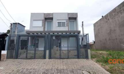 Casa com 3 dormitórios para alugar, 125 m² por R$ 2.870,00/mês - Guarujá - Porto Alegre/RS