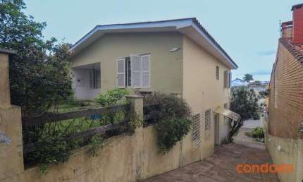Casa com 3 dormitórios para alugar, 259 m² por R$ 4.318,18/mês - Tristeza - Porto Alegre/RS