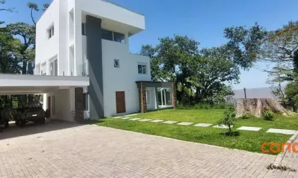 Casa com 4 dormitórios para alugar, 360 m² por R$ 30.400,00/mês - Pedra Redonda - Porto Alegre/RS