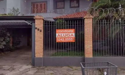 Casa com 3 dormitórios para alugar, 200 m² por R$ 8.271,57/mês - Aberta dos Morros - Porto Alegre/RS