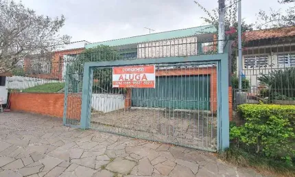 Casa com 6 dormitórios para alugar, 220 m² por R$ 6.500,00/mês - Vila Assunção - Porto Alegre/RS