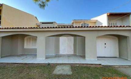 Casa com 4 dormitórios para alugar, 172 m² por R$ 6.975,00/mês - Cavalhada - Porto Alegre/RS
