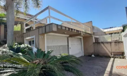 Casa com 3 dormitórios para alugar, 222 m² por R$ 4.699,47/mês - Hípica - Porto Alegre/RS