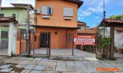 Casa com 3 dormitórios para alugar, 60 m² por R$ 1.440,00/mês - Vila Nova - Porto Alegre/RS